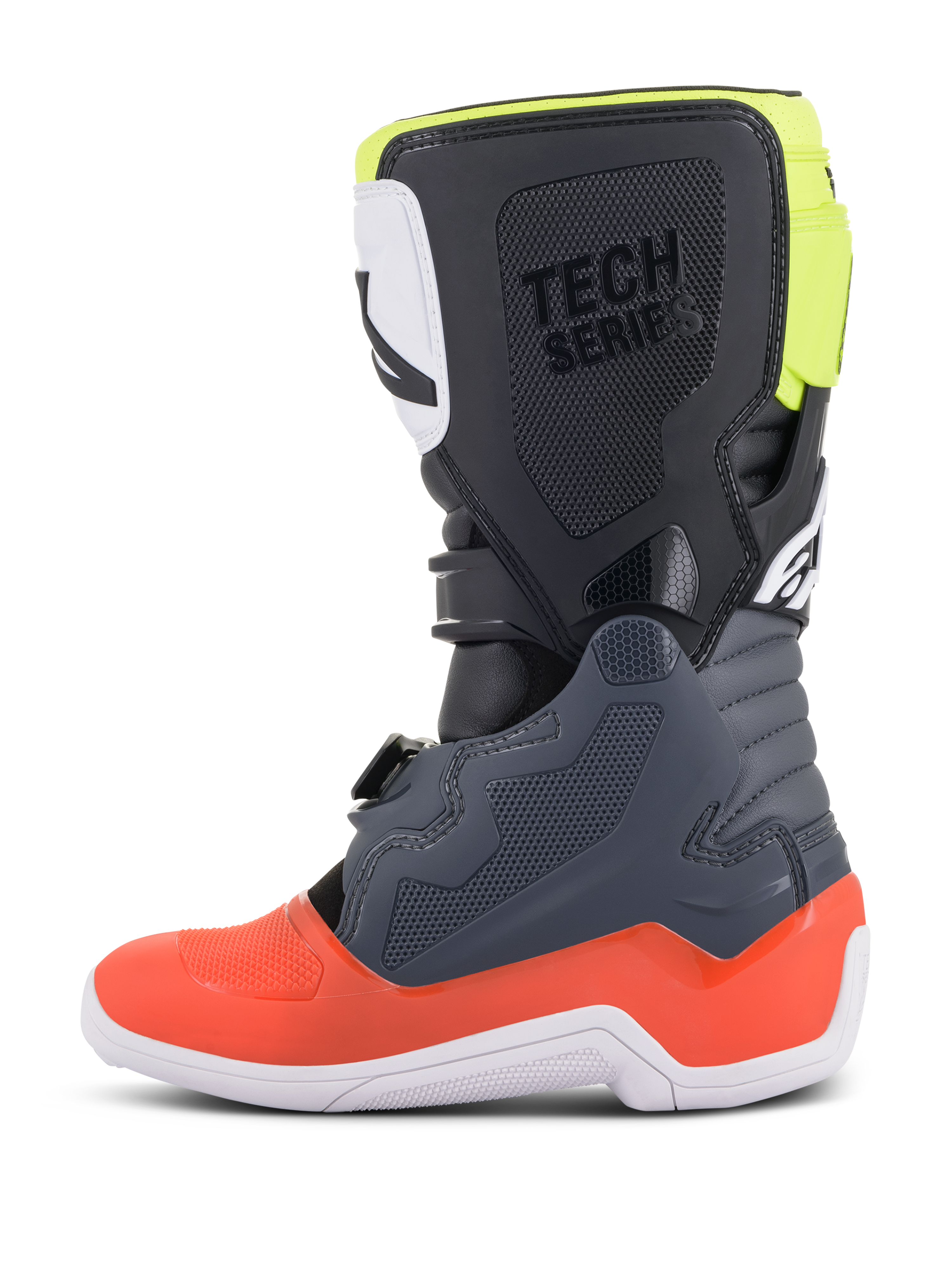 Botas Alpinestars Youth Tech 7S, botas de motocross, color gris oscuro con detalles en rojo y amarillo fluorescente, vista de perfil lateral, suela blanca, marca 'TECH SERIES' y paneles protectores de TPU duraderos.