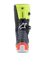 Botas Alpinestars Youth Tech 7S, botas de motocross para jóvenes, gris oscuro, rojo fluorescente y amarillo fluorescente, vista trasera con zonas de flexión de acordeón, protector de talón rojo y logotipo blanco de Alpinestars