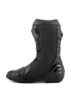 Botas Alpinestars Supertech R, botas de motociclismo de competición, color negro, vista de perfil lateral con espinillera de TPU, protector de talón reforzado y zonas de flexión en acordeón para un movimiento natural, calzado de alto rendimiento para pista y calle profesional