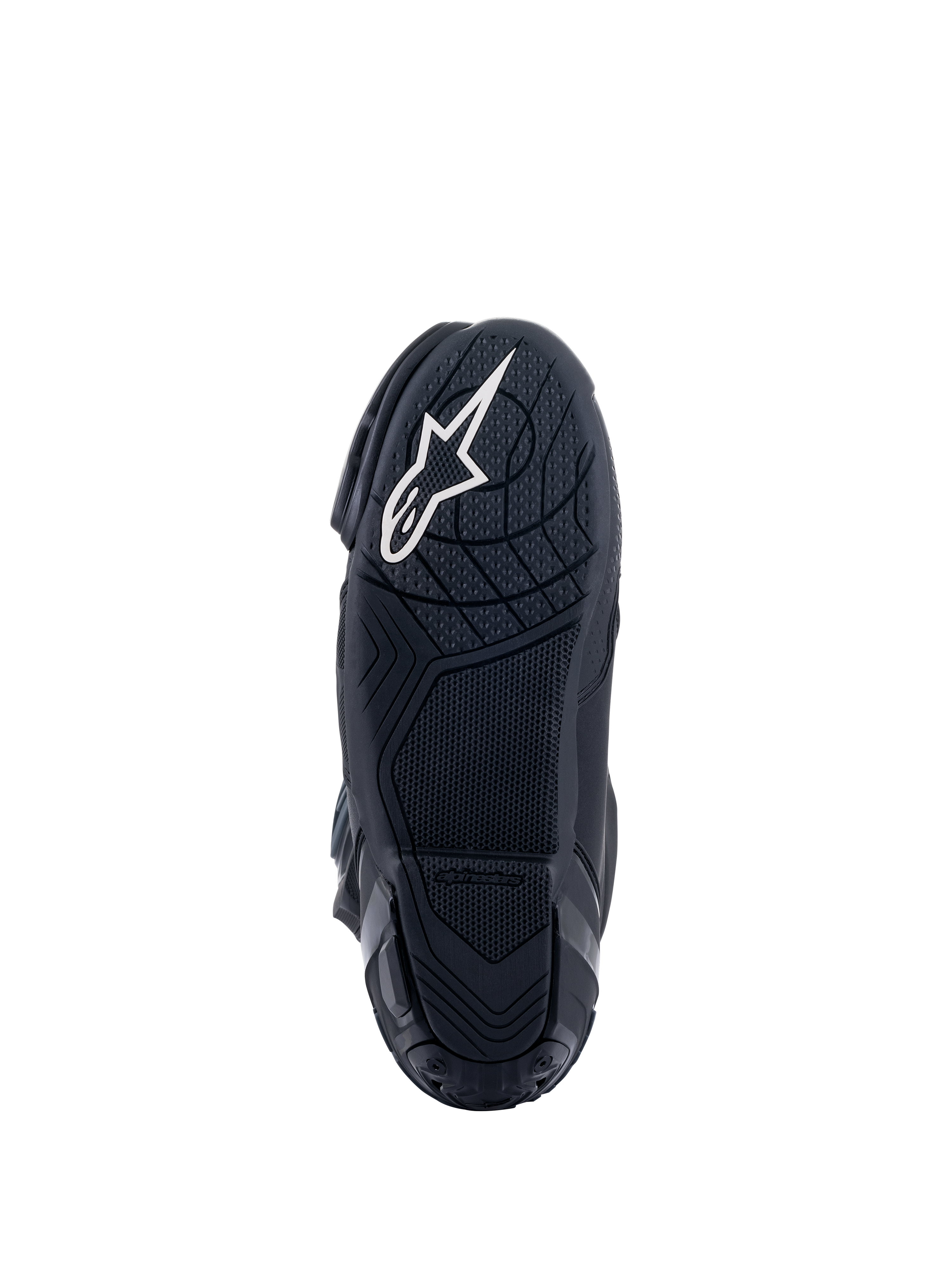 Botas Alpinestars Supertech R, botas de motociclismo de competición, negras, vista inferior de la suela de compuesto de goma con patrones de agarre texturizados, con el logotipo de la estrella de Alpinestars en blanco en el talón