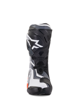 Alpinestars Supertech R Boots, Motorcycle Racing Boots, Black Red Fluo White and Gray, front view featuring a prominent white star logo on the TPU shin plate, technical design with ventilated mesh panels and protective sliders.