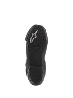Alpinestars SMX Plus V2, botas de moto para carreras, suela de caucho negra con logotipo blanco y patrón de alto agarre.