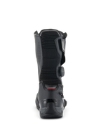 Botas Alpinestars SP-X BOA, botas deportivas de moto de media caña, negras, vista trasera que destaca el panel de flexión de acordeón acanalado, la talonera de TPU reforzada y el dial lateral del sistema de ajuste BOA