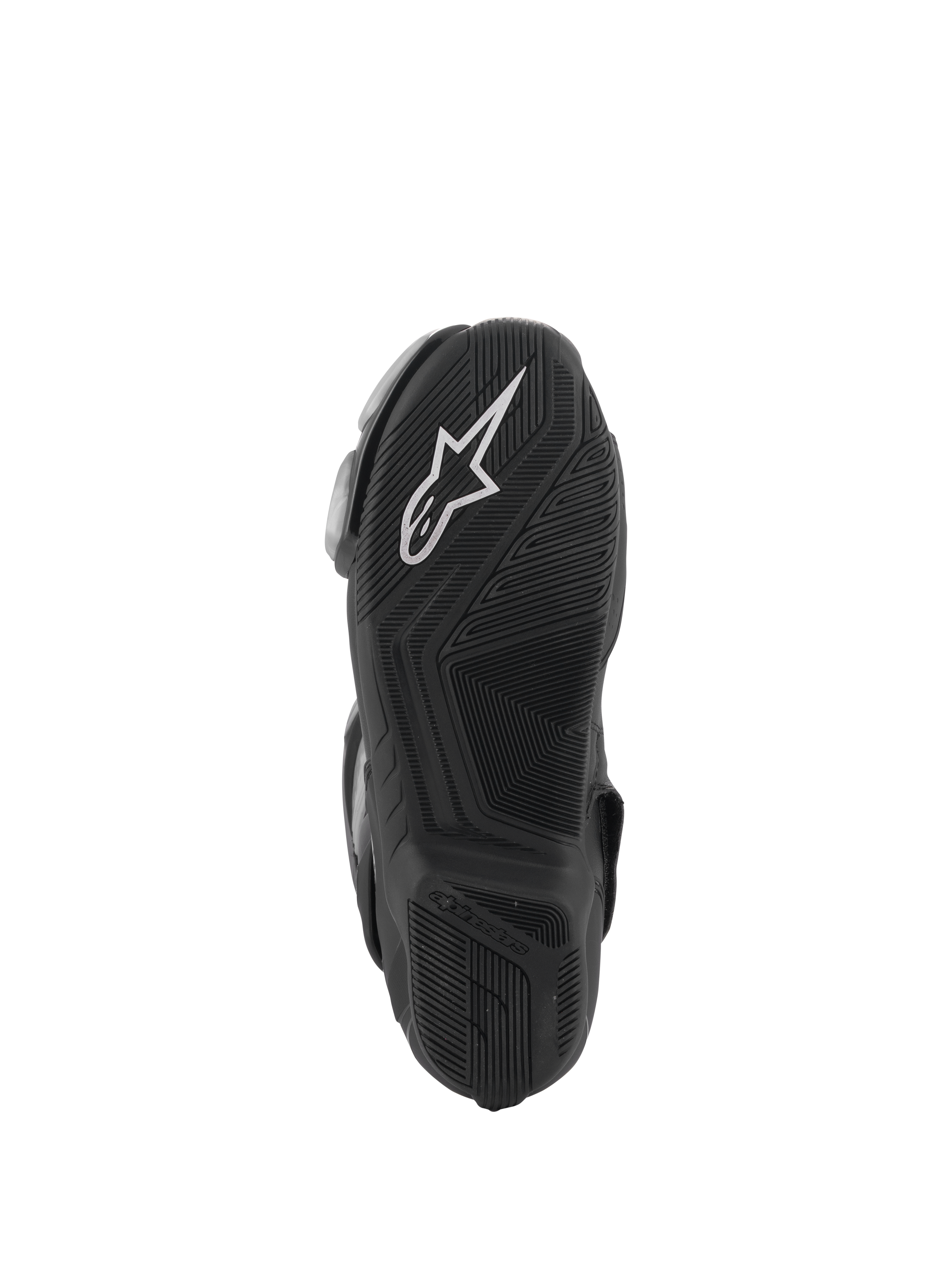 Botas Alpinestars SMX-6 V3, negras, vista de la suela con una suela exterior de caucho texturizado para mayor agarre, logotipo blanco de Alpinestars en el talón, marca en relieve, diseñadas para conducción de alto rendimiento en pista y calle.