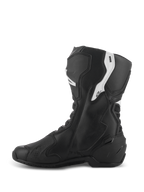 Botas Alpinestars Stella SMX-6 V3, botas de rendimiento para mujer, negro y blanco, vista lateral medial con parte superior de microfibra ergonómica, protección de TPU en espinilla y tobillo, zonas de malla flexible y diseño aerodinámico para uso en pista y calle