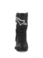 Botas Alpinestars Stella SMX-6 V3, botas de moto para mujer, negras y blancas, vista frontal que muestra el logotipo blanco de Alpinestars en la espinilla, protección de TPU y paneles de flexión ergonómicos, diseñadas para el rendimiento en pista y calle.