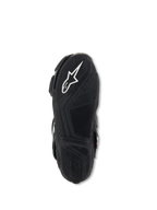 Botas Alpinestars Stella SMX-6 V3, vista de la suela inferior, caucho ligero negro con patrones de agarre texturizados, con el logotipo blanco de Alpinestars y marca en relieve para mayor tracción y control de los pedales
