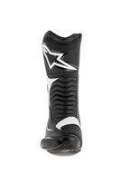 Botas Alpinestars SMX S, botas de moto, negro y blanco, vista frontal con un gran logotipo blanco de Alpinestars en la espinilla, paneles flexibles de acordeón y construcción de microfibra duradera con protectores de PU