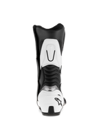 Botas Alpinestars SMX S, negro y blanco, vista trasera que muestra el contrafuerte del talón blanco con el logotipo de la estrella negra, paneles flexibles de acordeón acanalados y refuerzo blanco en la parte superior de la pantorrilla, botas de microfibra duradera para motociclismo deportivo