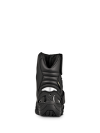 Botas Alpinestars New Land GORE-TEX, botas de moto para carretera y touring, negras, vista trasera con zonas de flexión tipo acordeón acolchadas, inserto reflectante en el talón y suela de caucho duradera.