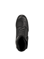 Botas Alpinestars New Land GORE-TEX, negras, vista desde arriba, con construcción de cuero de plena flor, zonas de flexión frontales de tipo acordeón y protector de cambio reforzado, botas de motociclismo de media caña impermeables para carretera y touring
