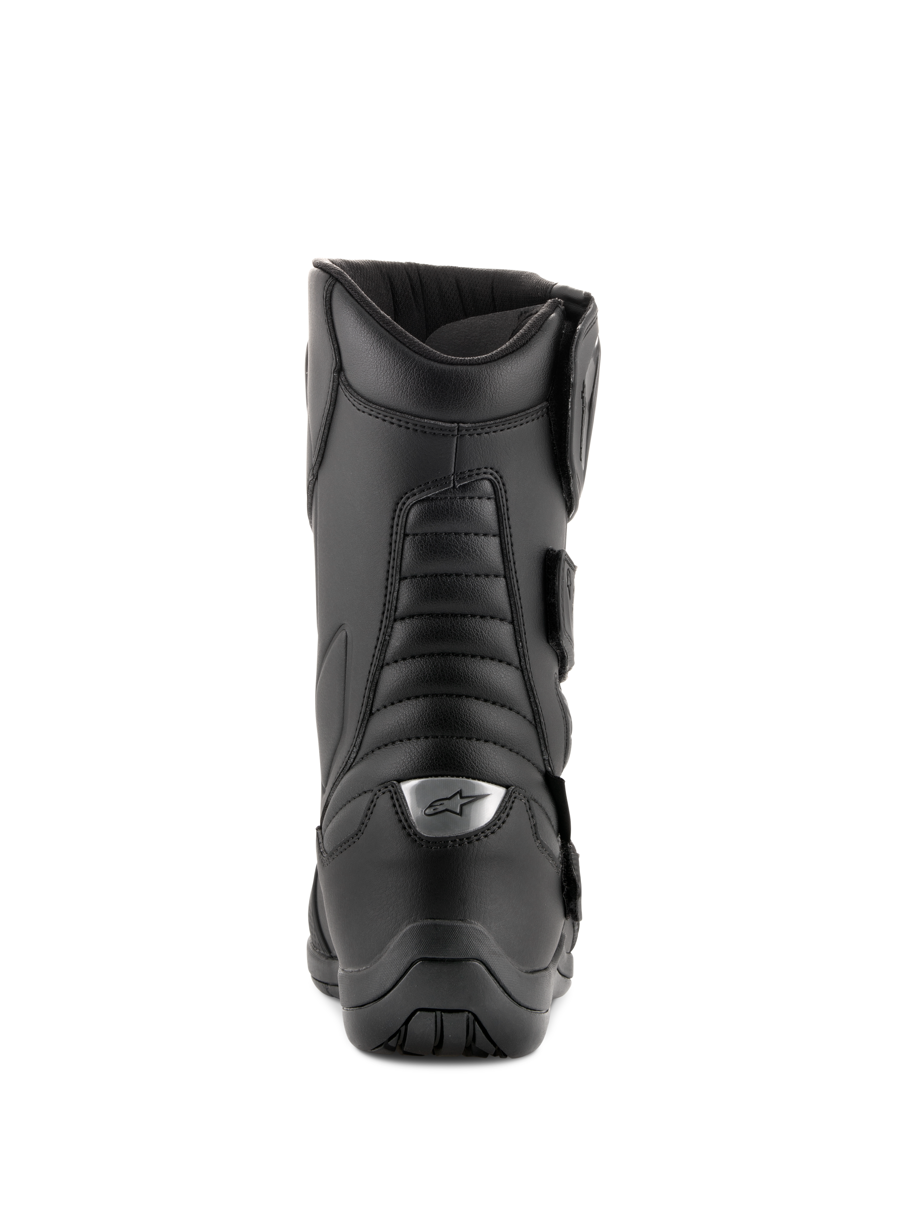 Botas Alpinestars Radon Drystar®, negras, botas de touring para moto, vista trasera con zonas flexibles de acordeón y logotipo plateado en el talón, construcción duradera en microfibra