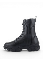 Botas Alpinestars Ava, calzado de moto urbano para mujer en cuero negro con suela de goma elevada y diseño moderno.