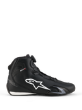Alpinestars Celer Shoes, Motorcycle Riding Shoes, Black and White, lateral side profile with large white star logo, Rotor Closure System dial for fit adjustment, and sleek sport-performance silhouette
