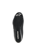 Alpinestars Celer Shoes, Motorcycle Riding Shoes, Black White, underside view of the oil-resistant rubber sole featuring a textured grip pattern and white Alpinestars branding.