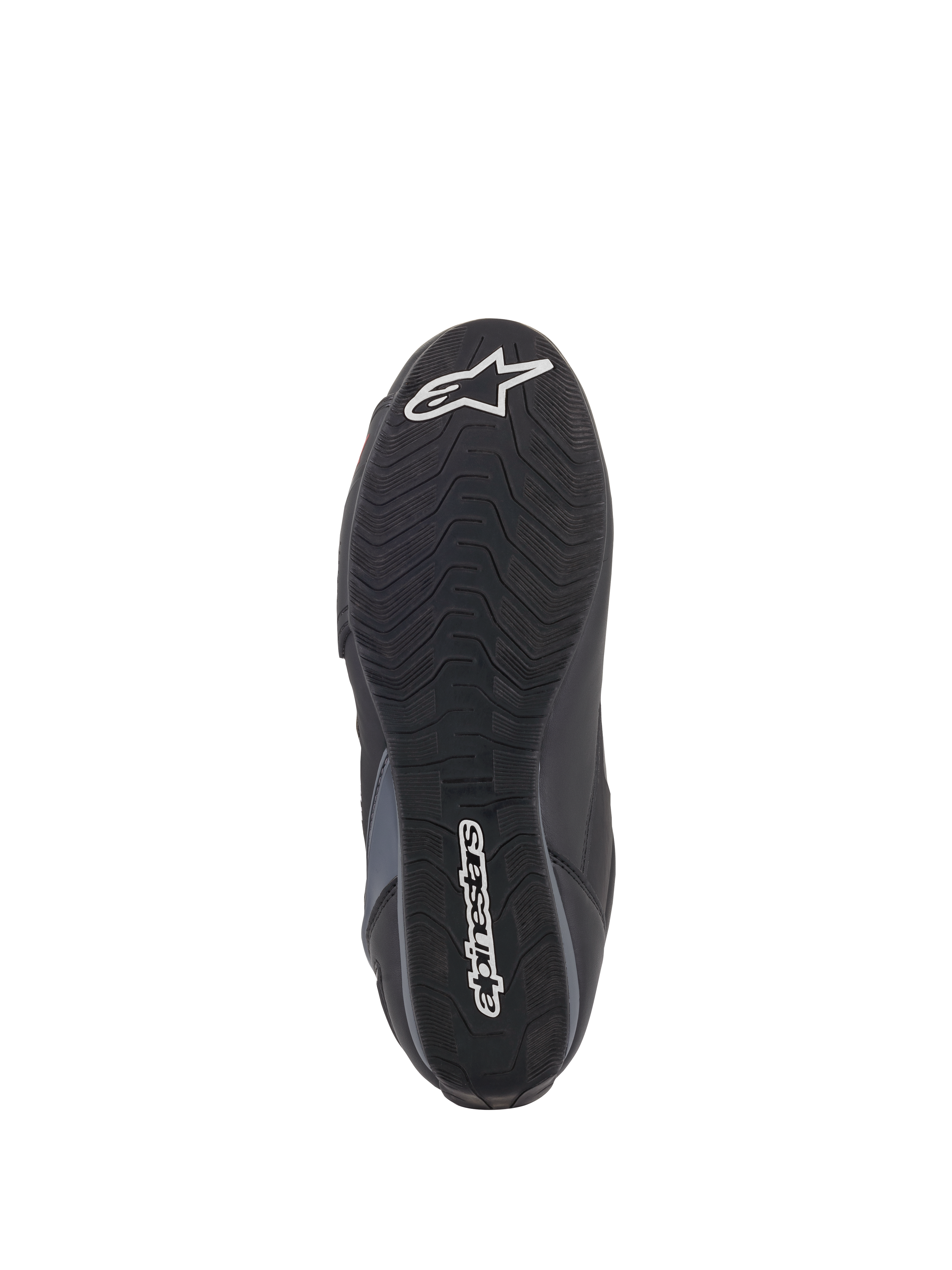 Zapatos Alpinestars Faster-3 Rideknit®, vista de la suela, suela de goma negra con patrón de tracción ondulado, con el texto de Alpinestars y el logo de la estrella en blanco, mostrando detalles de agarre para la conducción de motocicletas