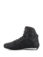 Zapatillas Alpinestars Stella Faster-3 Rideknit® para mujer, calzado de conducción para moto en negro, amarillo y rosa, vista de perfil lateral, con un diseño estilizado de caña alta con paneles perforados y un detalle blanco en el talón.