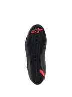 Zapatos Alpinestars Stella Faster-4, vista inferior de la suela, negro y rosa diva, con un patrón de agarre de goma texturizada, logotipo de Alpinestars en el talón y estructura integrada para soporte, suela duradera para motociclismo