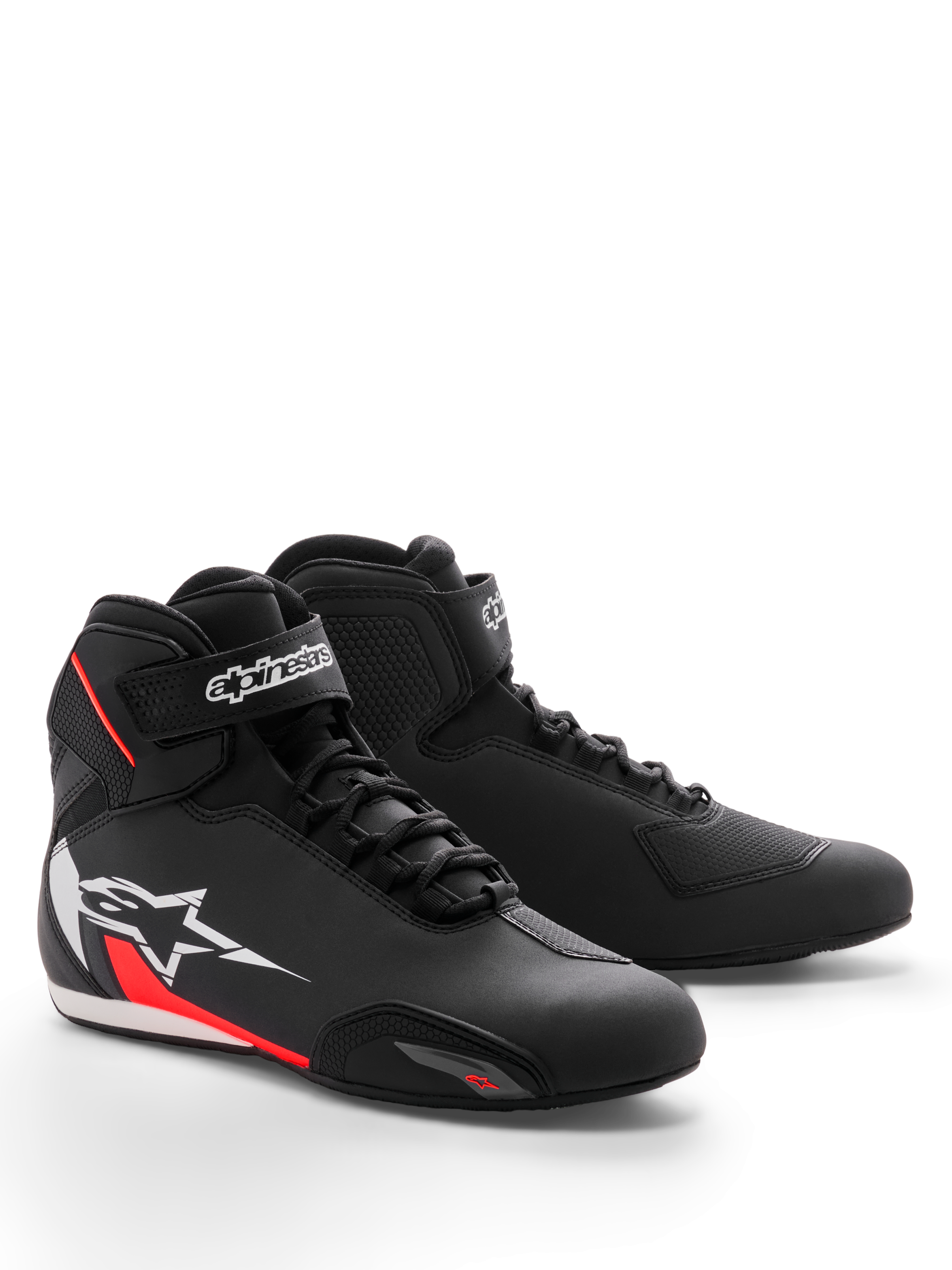 Alpinestars Sektor Shoe, Motorcycle Riding Shoes, Black White and Red Fluo, featuring a sleek microfiber chassis, speed lacing system with hook-and-loop ankle strap, and large white star logo with red accents on the side