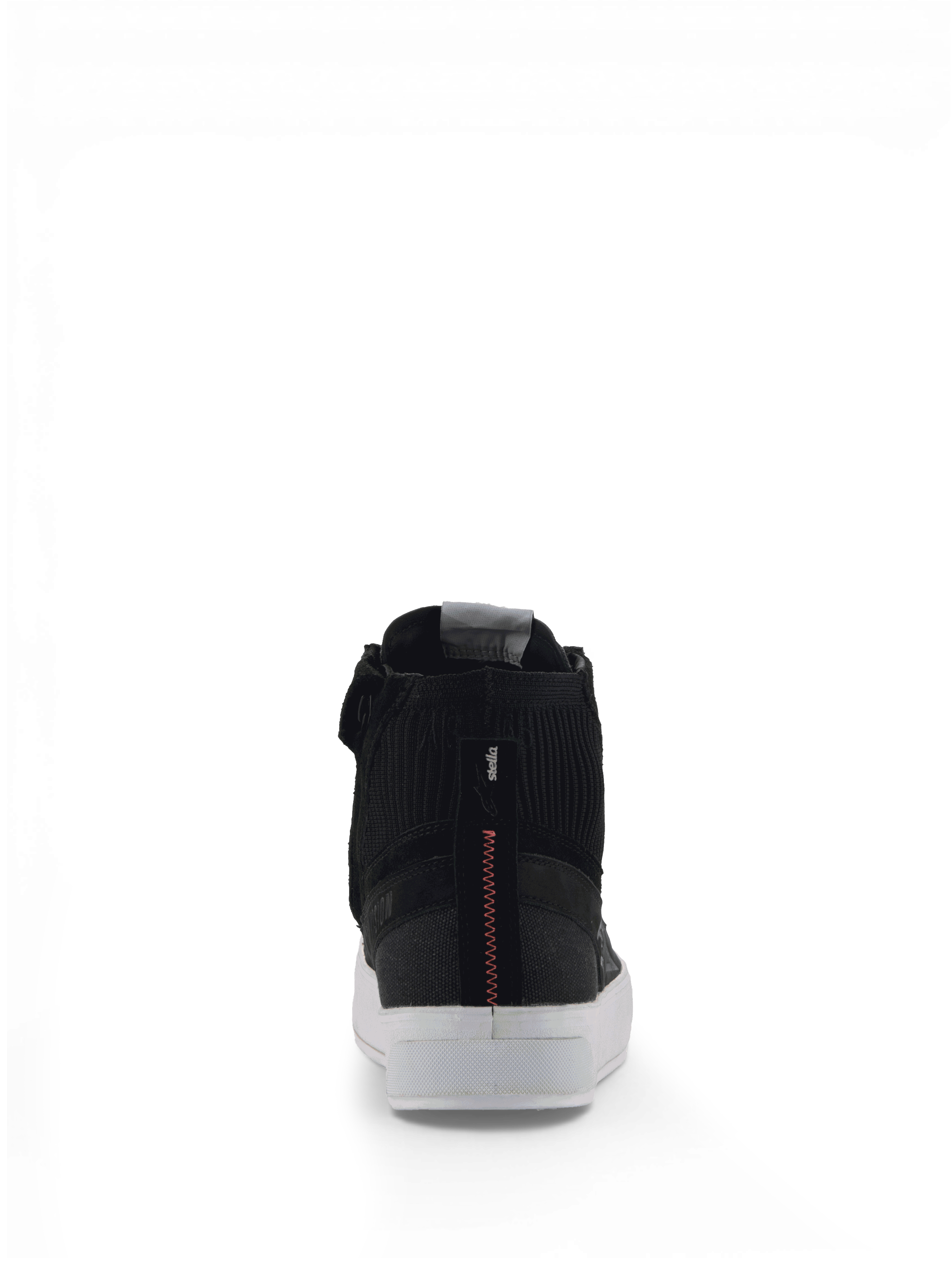 Alpinestars Stella Stated Podium, zapatos de moto urbanos para mujer, color negro y blanco con costura roja en el talón.