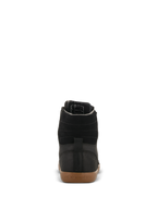 Alpinestars J-6 Waterproof Shoe, zapato para motociclismo, negro y color caramelo, vista trasera con parte superior de cuero negro de alta calidad, costuras horizontales en el tobillo y suela de goma con el logotipo de Alpinestars en relieve.