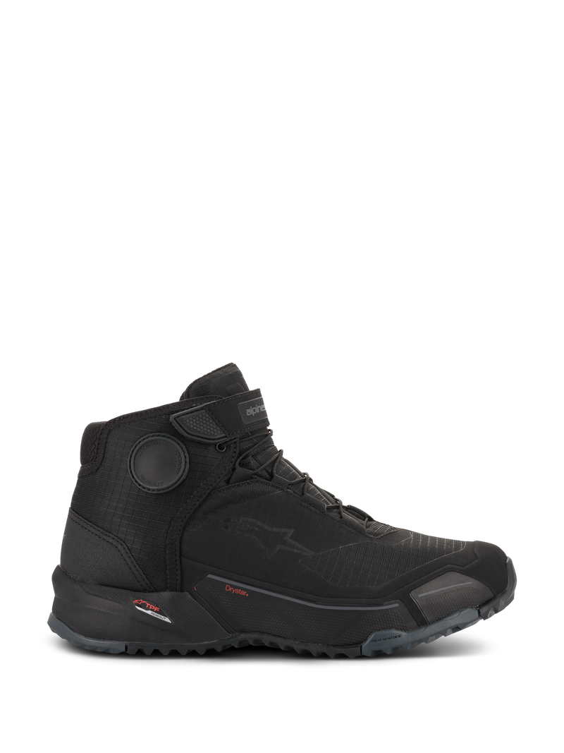 Alpinestars CR-X Drystar® Riding Shoes, zapatillas de moto, negro, vista de perfil lateral, diseño elegante inspirado en zapatillas con una suela robusta, con marca Drystar y discos protectores en el tobillo