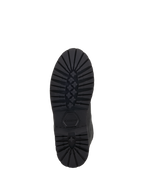 Zapatos Alpinestars Turnstone, negros, vista inferior de la robusta suela de goma con dibujo profundo de patrón de estrella y logotipo de Alpinestars grabado, calzado duradero para conducción urbana en motocicleta