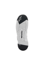 Alpinestars Speedflight Shoes, zapatos de motociclismo, negros y blancos, vista inferior de la suela con goma de doble densidad, logotipo de Alpinestars y logo TPF Transversal Protection Frame, patrón de dibujo diseñado para el agarre