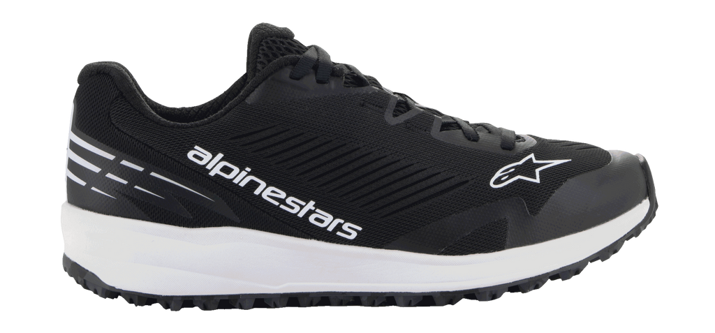 Zapatillas Alpinestars Meta Road V2, calzado deportivo negro con suela blanca gruesa, logo de estrella y marca en blanco, parte superior de malla texturizada, cordones negros y suela de gran agarre, diseño deportivo ligero para ropa de trabajo de equipos de carreras y uso casual