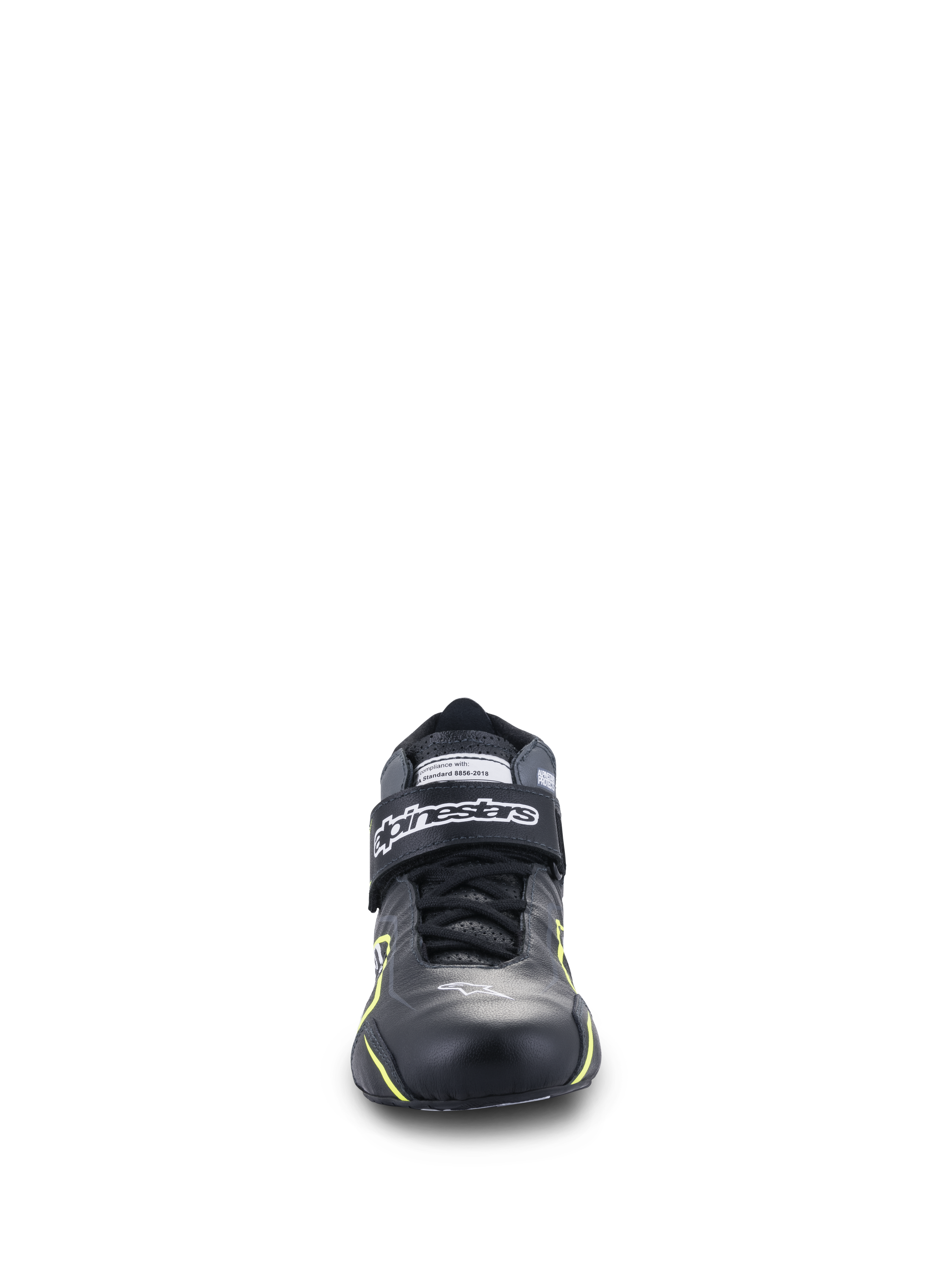 Zapatos Alpinestars Tech-1 T V3 FIA, calzado de automovilismo, negros con detalles en amarillo flúor, vista frontal, construcción íntegramente en cuero con correa de velcro en el tobillo, logotipo de Alpinestars en blanco, diseño técnico para conducción de alto rendimiento