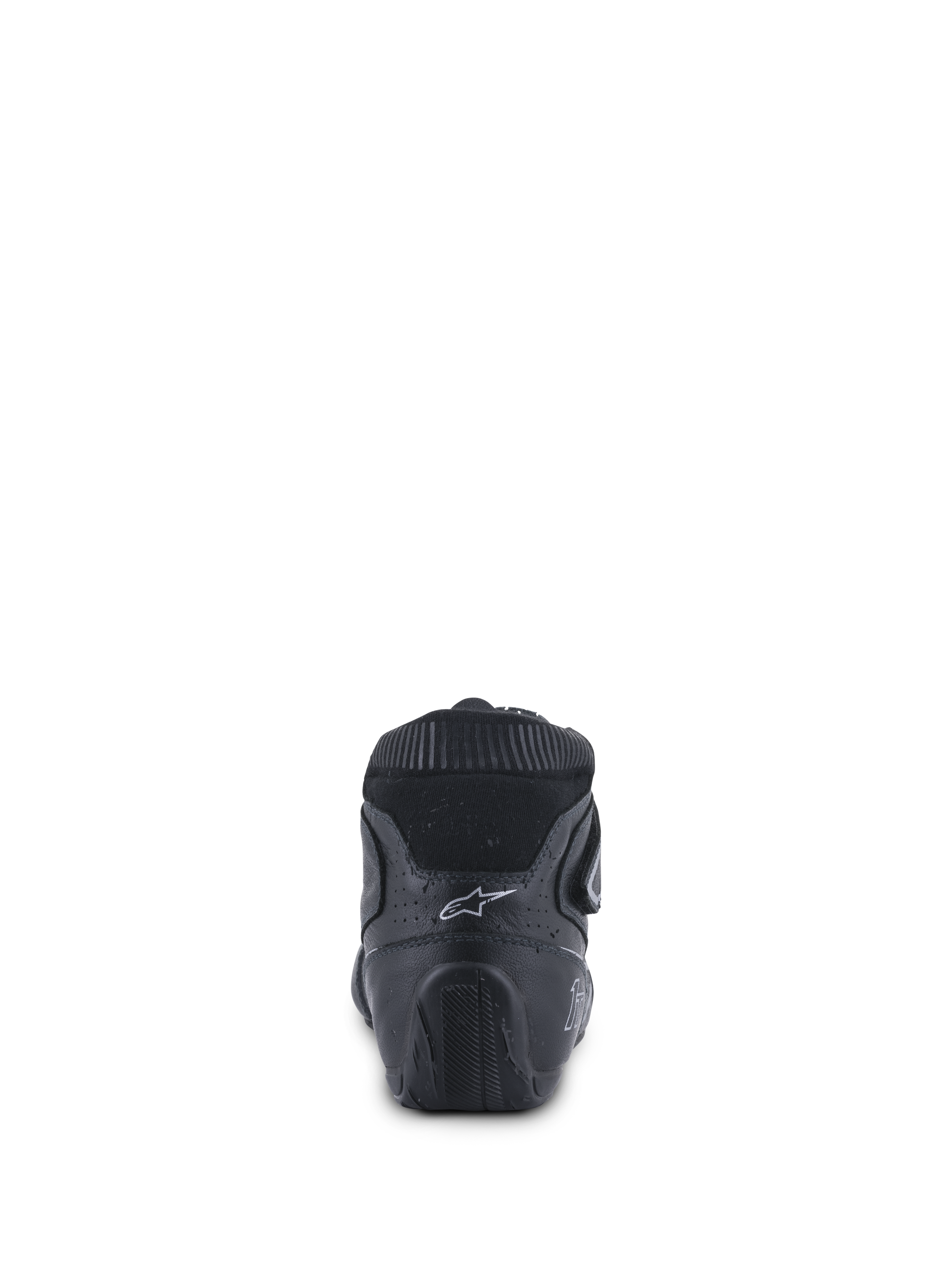 Alpinestars Tech-1 T V3 Shoes FIA, zapatos de automovilismo, negro y plateado, vista trasera que muestra el contrafuerte ergonómico del talón, el logotipo blanco de Astars y la suela de goma texturizada diseñada para el control de los pedales.
