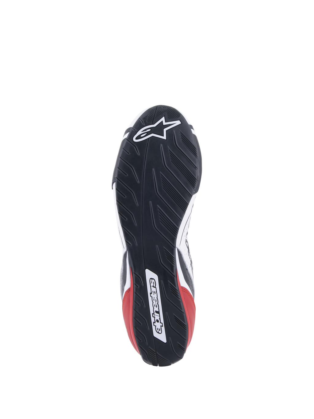 Zapatillas Alpinestars Tech-1 T V3 FIA, calzado de automovilismo, blanco, negro y rojo, vista detallada de la suela de goma asimétrica inspirada en el dibujo de un neumático, con el logotipo y el nombre de Alpinestars, diseño de suela resistente al aceite y repelente al agua