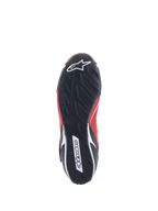 Zapatos Alpinestars Tech-1 T V3 FIA, calzado de automovilismo, rojo, negro y blanco, vista inferior de la suela de goma negra con un patrón de dibujo de neumático asimétrico y logotipo de Alpinestars en blanco