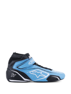 Zapatillas Alpinestars Tech-1 T V3 FIA, calzado de automovilismo de caña alta, azul claro y negro con detalles blancos, vista lateral con correa de velcro, logo de estrella blanco, construcción de cuero perforado y suela delgada de alto rendimiento