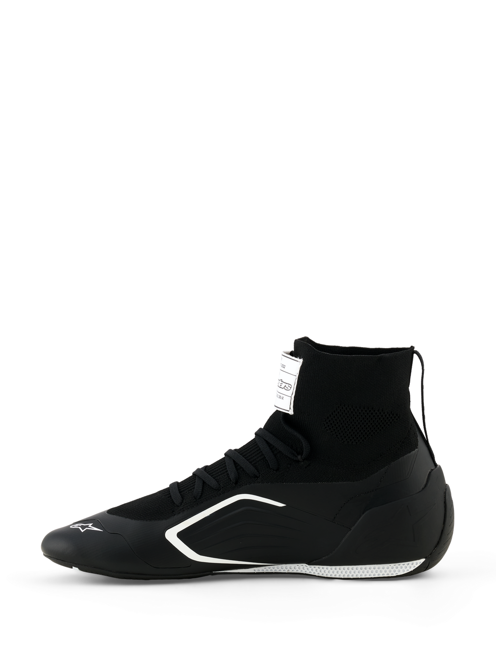 Alpinestars Supertech K Shoes - FIA, zapatillas de karting, en negro y blanco, vista de perfil lateral, con una construcción de caña alta completamente tejida, gráficos laterales angulares en blanco y logotipo blanco en la punta, calzado técnico de carreras