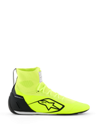 Zapatillas Alpinestars Supertech K - FIA, zapatillas de karting, amarillo fluo y negro, vista de perfil lateral, parte superior de punto con cuello de tobillo alto, contrafuerte de talón de TPU negro, logotipo grande de Alpinestars en negro, calzado de competición ligero