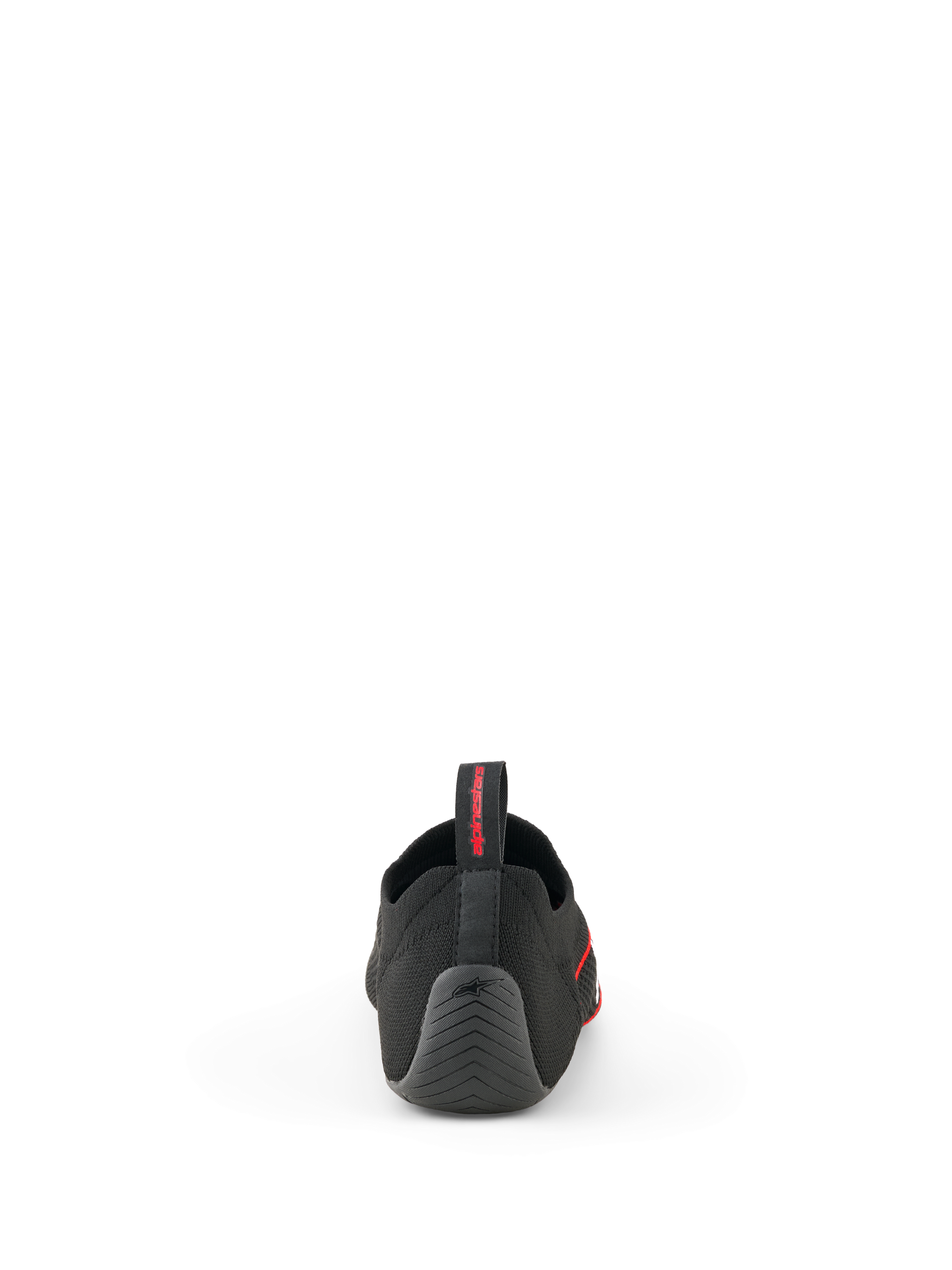 Alpinestars Tech Gaming Shoes, Black, back view showing the seamless knitted upper, textured rubber heel with star logo, and rear pull tab with red branding, SIM-racing footwear