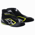 Alpinestars SP+ Shoes, zapatillas de automovilismo, negro y amarillo flúor, diseño de caña alta con logo de estrella blanca y detalles en amarillo neón, construcción en cuero y gamuza, suelas delgadas de goma inspiradas en la F1, estética deportiva de automovilismo