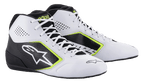 Zapatillas Alpinestars Tech-1 K Start V2, calzado de karting, blanco, negro y amarillo flúor, con paneles laterales perforados, logotipo de estrella blanca grande y detalles en amarillo neón, calzado profesional para automovilismo