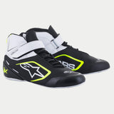 Zapatos Alpinestars Tech-1 K V2, calzado para karting, negro, blanco y amarillo flúor, calzado de carreras de caña media con microfibra perforada, sistema de cierre doble con correa de velcro blanca y cordones, logotipo destacado de Alpinestars en el lateral