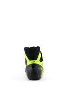 Zapatillas Alpinestars Tech-1 KX V3 - FIA, negro y amarillo flúor, vista trasera con enfoque en el talón, detalles en amarillo neón con logotipo de estrella negra y marca KX, calzado profesional para karting