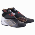 Alpinestars Tech-1 KZ V2, zapatos de carreras para karting, negros, blancos y dorados con detalles rojos, con parte superior de punto sin costuras y doble cierre de correa, puntera protectora, logo de estrella dorado y soporte de tobillo alto para un rendimiento de precisión en karting