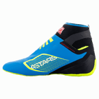 Zapatillas Alpinestars Tech-1 KZ V2, zapatillas de karting, azul esmalte con detalles en negro y amarillo flúor, vista de perfil lateral con construcción superior de tejido sin costuras y suela de goma fina derivada de la Fórmula 1, logotipo llamativo de ASTARS en el lateral.