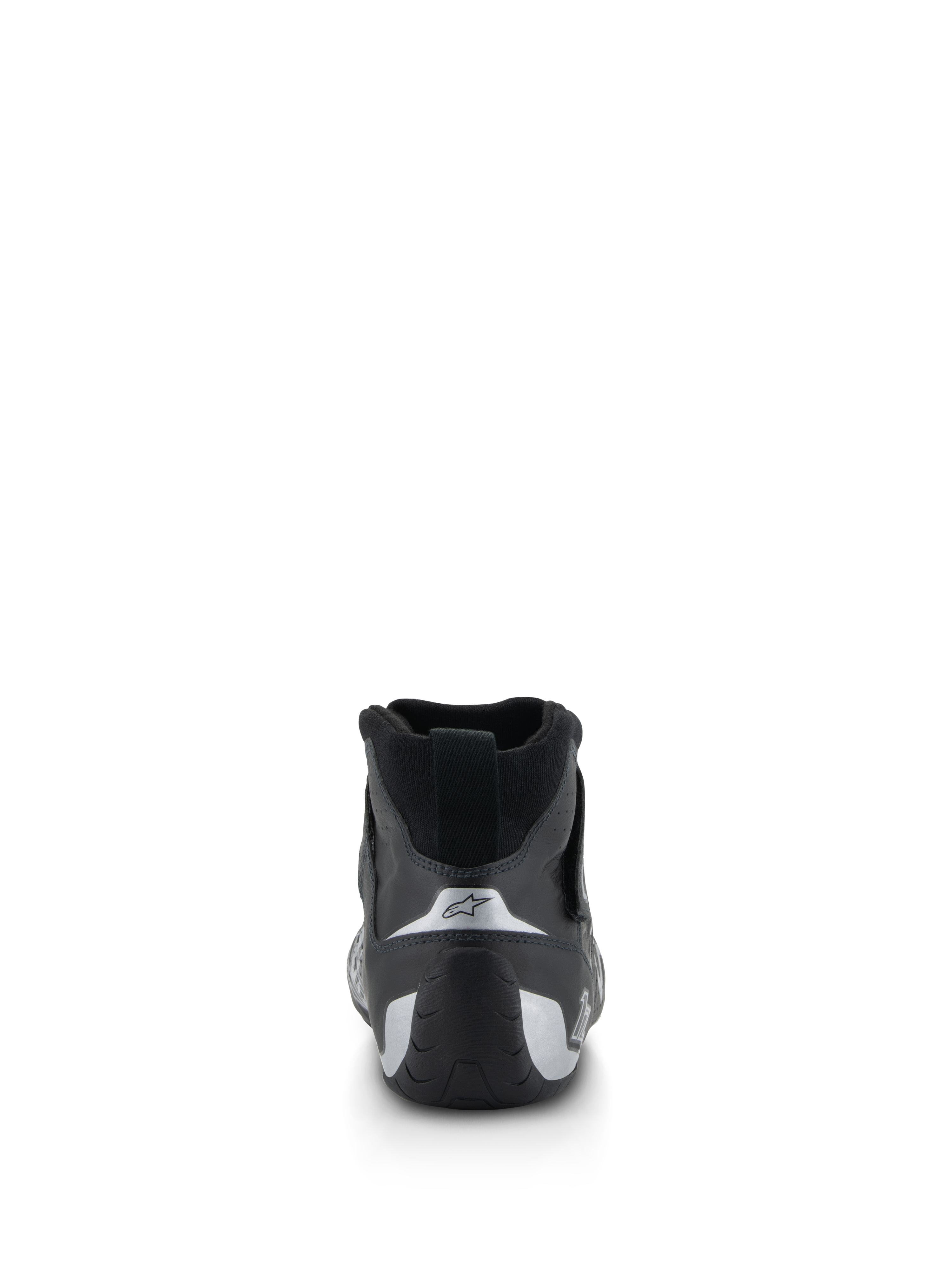 Alpinestars Tech-1 Z V3 Shoes FIA, zapatos de automovilismo, negro y plata, vista trasera que muestra el talón contorneado con detalles plateados y logo de la estrella, calzado profesional para deportes de motor