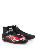 Alpinestars Tech-1 Z V3 Shoes FIA, zapatos de automovilismo, negros con detalles en rojo y blanco, con un gran logotipo de estrella blanca en el lateral, suelas rojas finas y sistema de cordones de alambre de precisión con correa en el tobillo