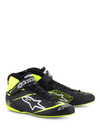 Alpinestars Tech-1 Z V3 Shoes FIA, zapatos de automovilismo, negro y amarillo flúor, con el logotipo Astars en blanco, sistema de cordones rápidos y correa en el tobillo, diseño de cuero de caña alta para automovilismo profesional