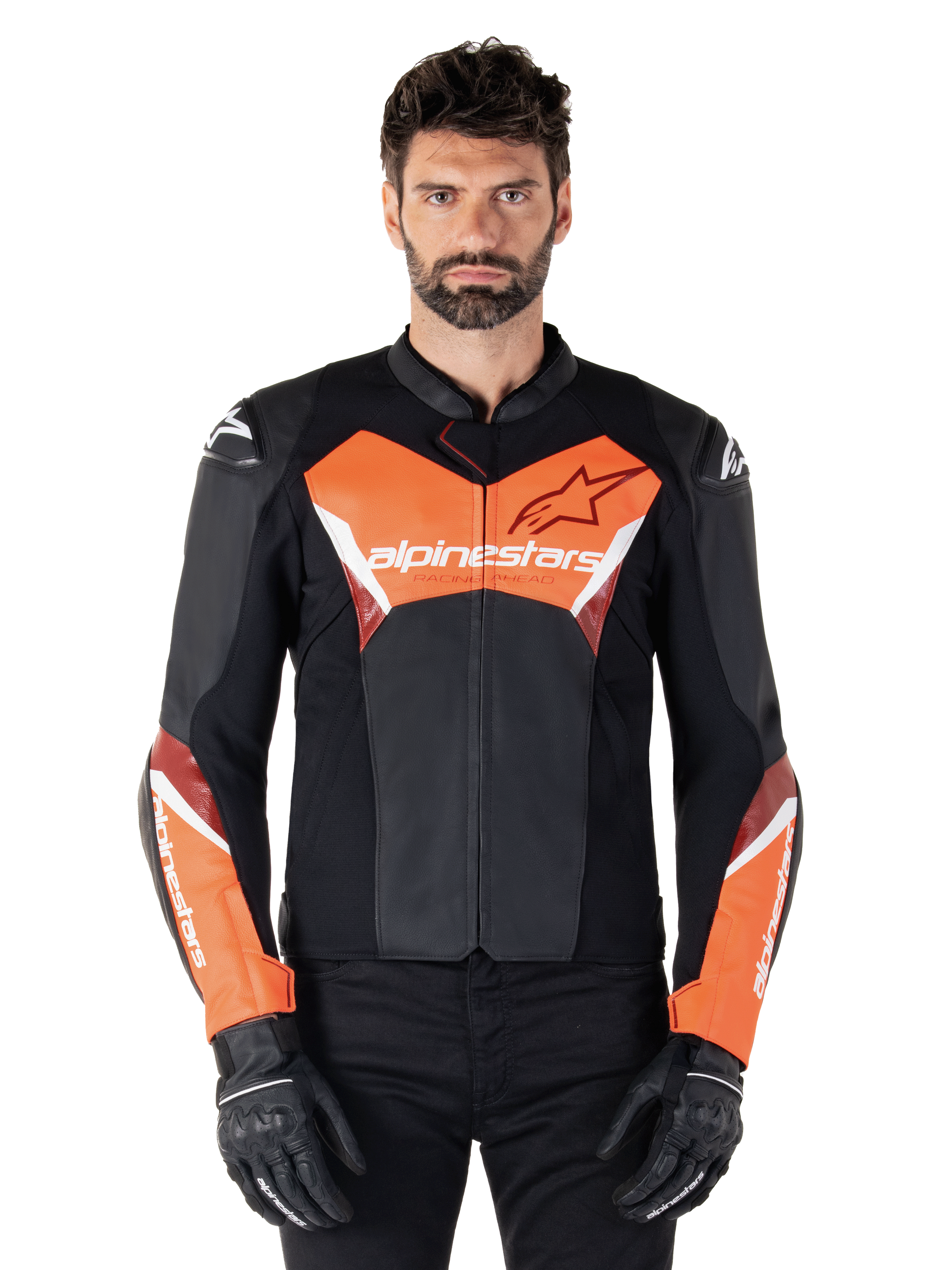 Alpinestars Faster V3 Leather Jacket, Sport Motorcycle Jacket, Black and Red Fluo, worn by a male model with black riding gloves and pants, featuring bold Alpinestars branding on chest and forearms, premium leather construction for road riding.
