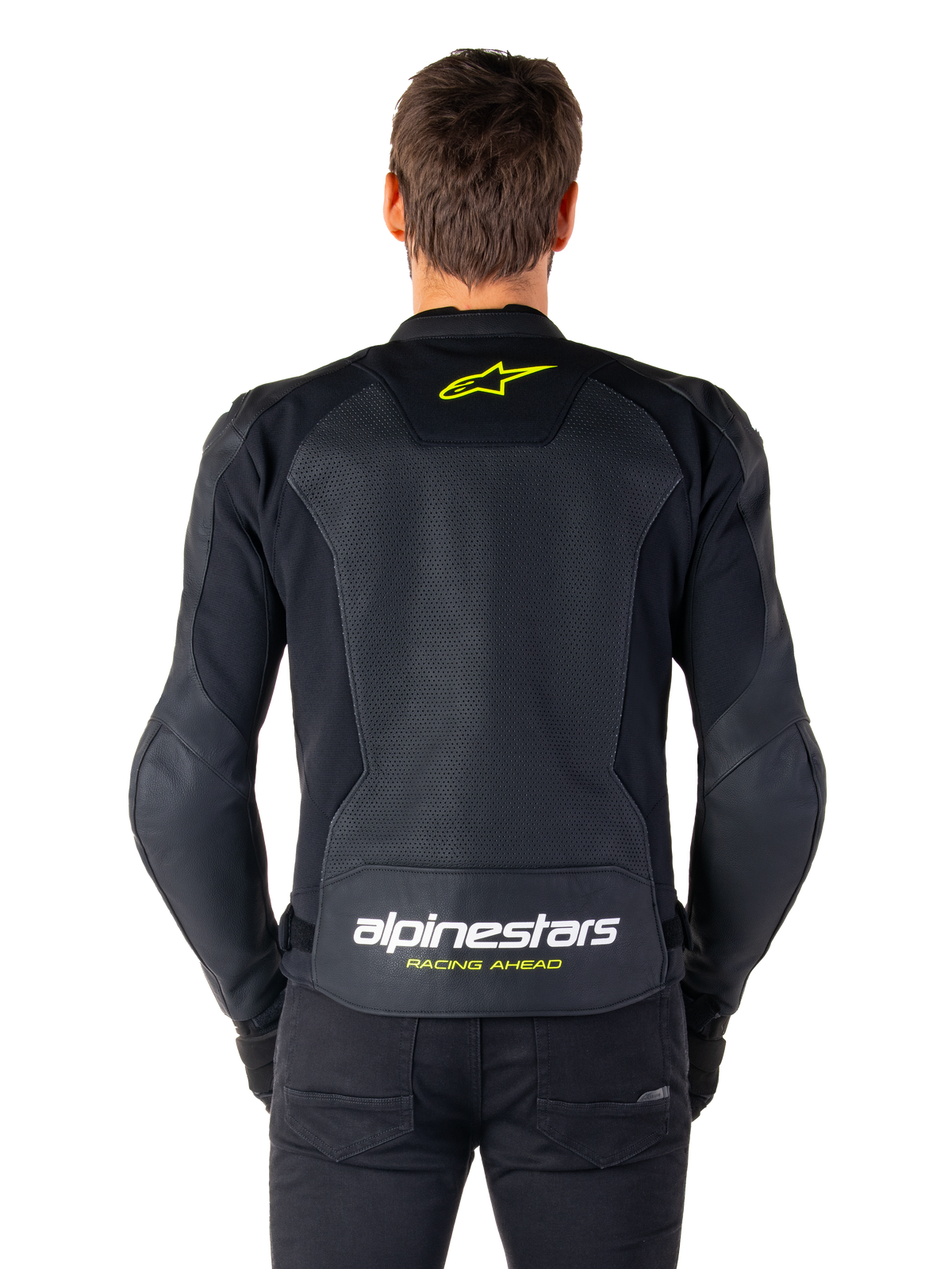 Chaqueta de cuero Alpinestars Faster V3 Airflow, chaqueta de moto deportiva, negra con detalles en amarillo flúor, vista trasera con grandes paneles de cuero perforado, logotipo de estrella amarilla en la parte superior y marca llamativa en la parte inferior de la espalda