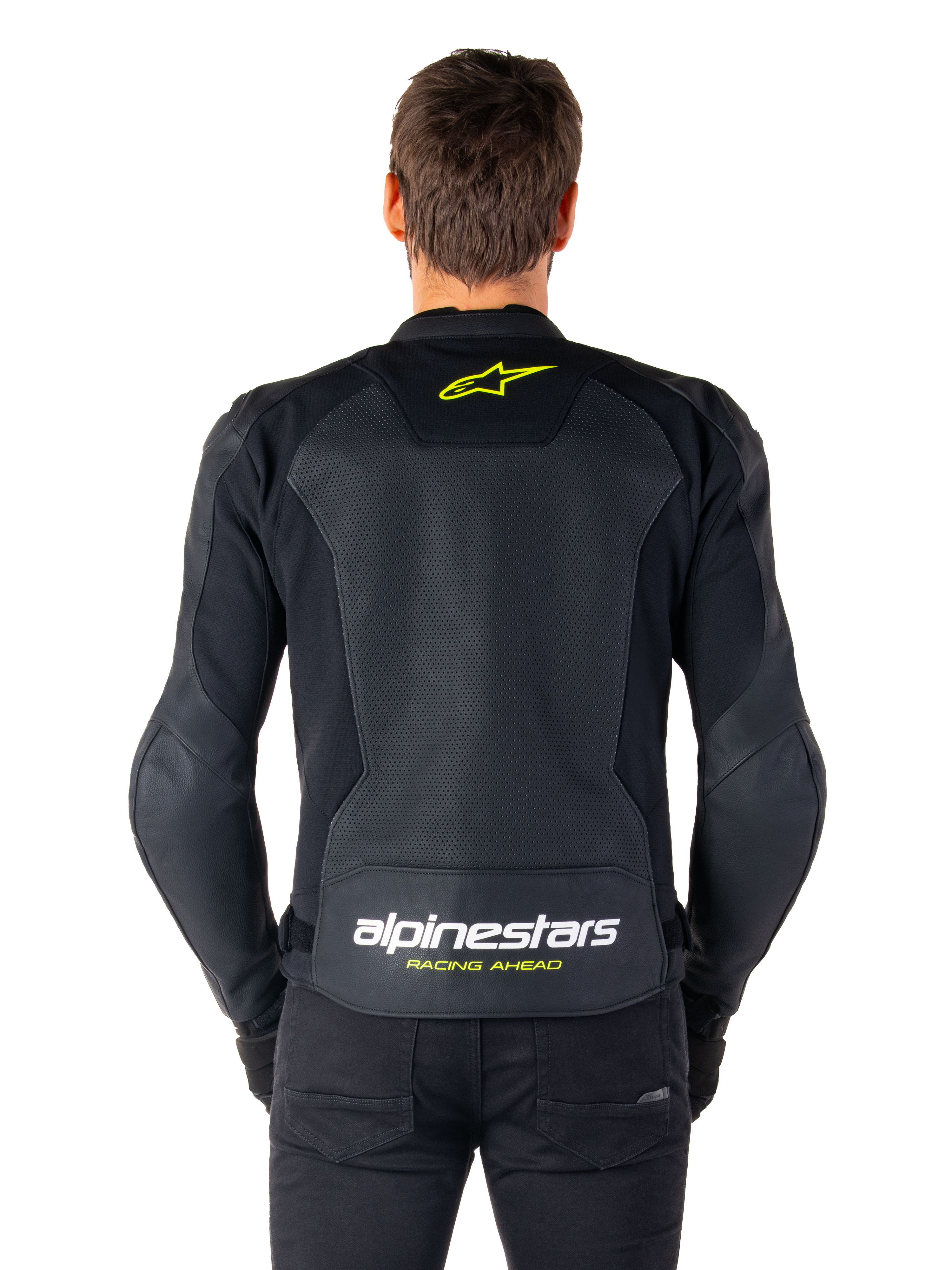 Chaqueta de cuero Alpinestars Faster V3 Airflow, chaqueta de moto deportiva, negra con detalles en amarillo flúor, vista trasera con grandes paneles de cuero perforado, logotipo de estrella amarilla en la parte superior y marca llamativa en la parte inferior de la espalda