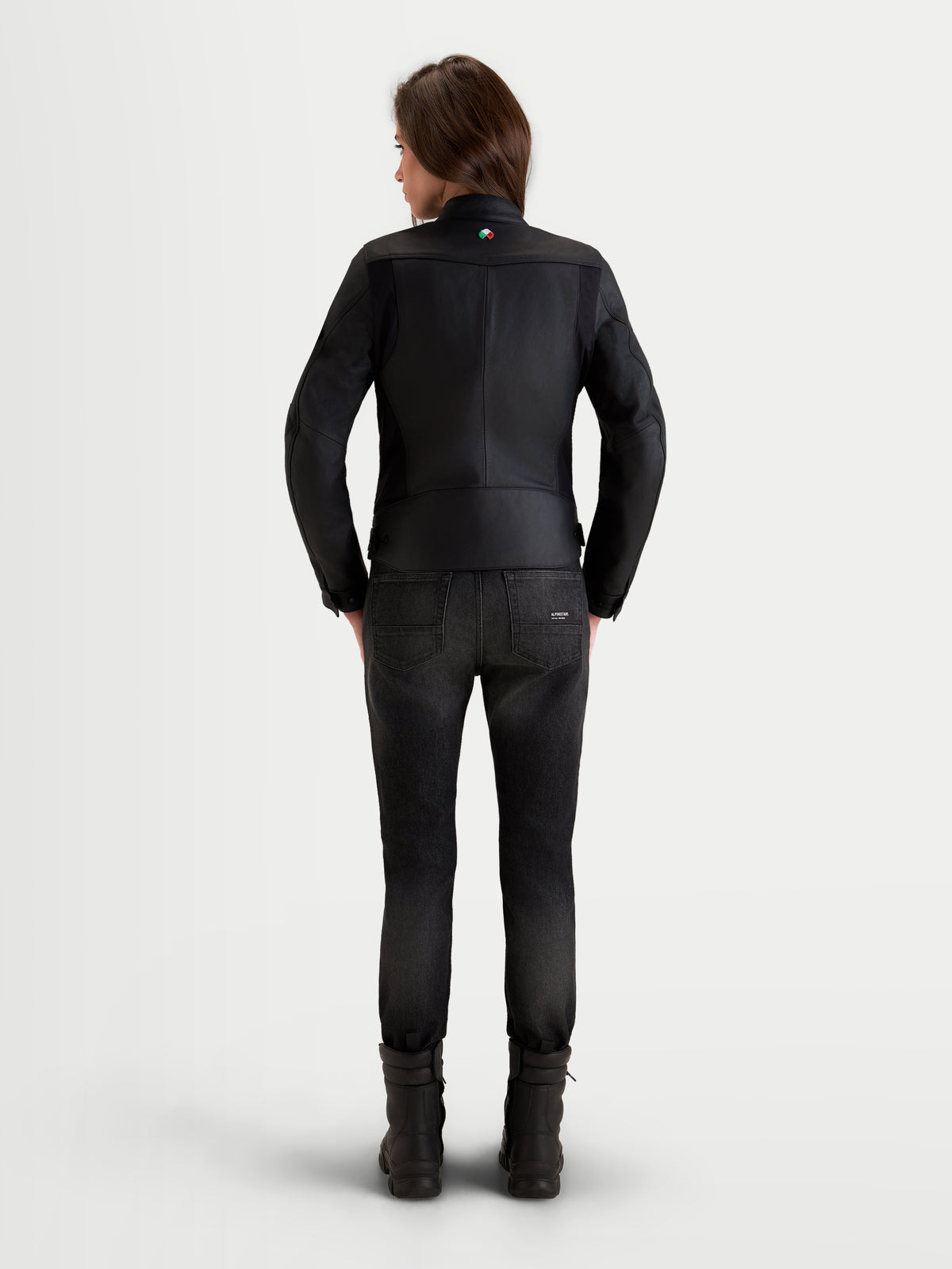 Alpinestars Stella Maver-X Leather Jacket, women's urban motorcycle leather jacket, black, rear view showing premium bovine leather construction worn by a model.